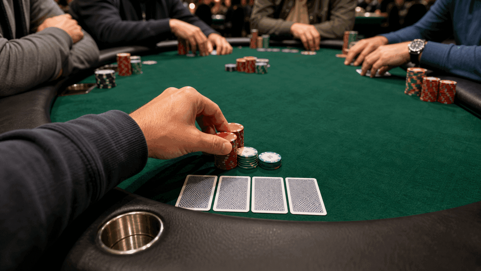 Early chips slide into the pot while several seats wait to respond.